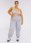 Grey matching set Track style Quilted material Crop top Fixed straps Wide neckline Invisible zip fastening at side High waisted pants Elasticated ankles Relaxed leg Elasticated waistband