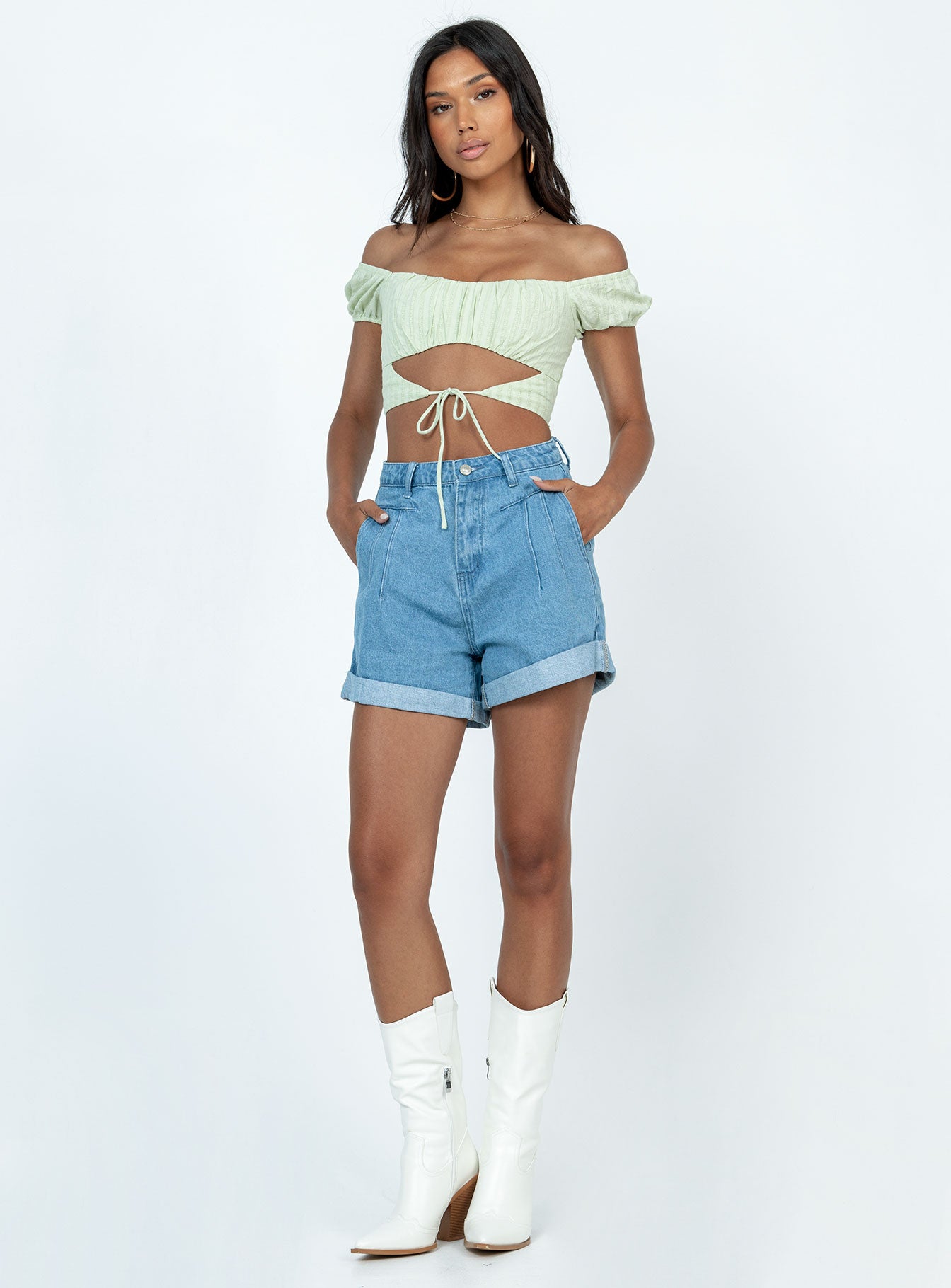 Denim shorts Zip & button fastening  Belt looped waist  Pleated waist  Twin hip pockets  Fixed rolled hem  Branded patch on back 