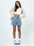 Denim shorts 100% cotton Mid-wash denim High waisted design Belt looped waist Zip & button fastening Classic five-pocket design Raw-edge hem