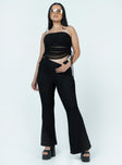 Black matching set Mesh material Strapless top Sheer design Adjustable tie sides Elasticated band at bust Flared leg pants