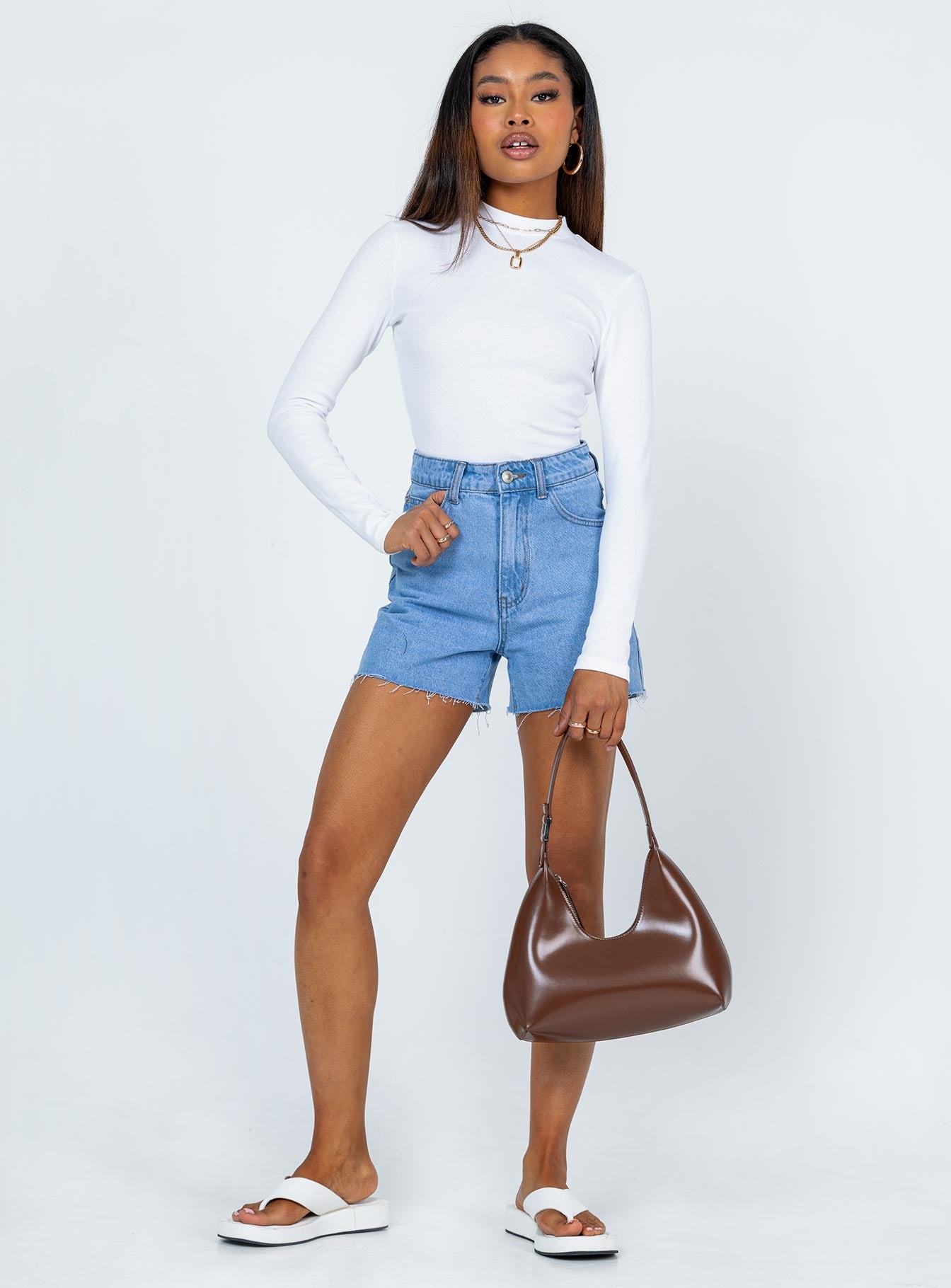 front view of model wearing Princess Polly Maleny Long Sleeve Bodysuit White Full Sleeves High Neck 