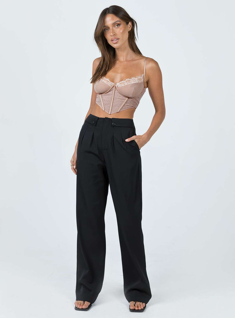 Crop top Sheer mesh material Adjustable shoulder straps Lace trim Wired cups Zip fastening at back Boning through front Pointed hem