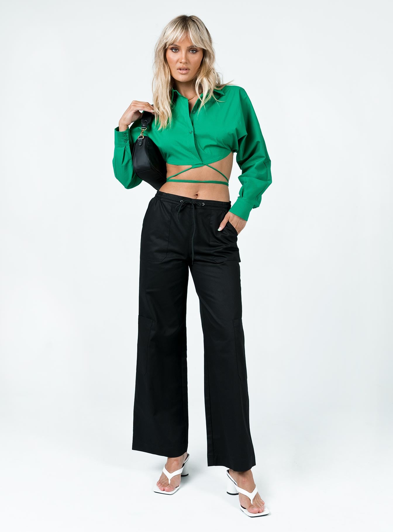 front view of model wearing Princess Polly Rylen Long Sleeve Top Green 