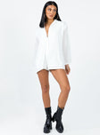 Long sleeve romper Textured material  Button front fastening  Wide sleeves 