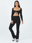 Matching set Soft knit material  Long sleeve top  Wide neckline  Tie fastening at bust  High waisted pants  Flared leg 