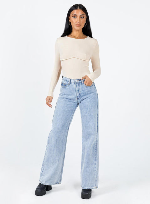 side view of model wearing Princess Polly Swenson Long Sleeve Bodysuit Beige Full Sleeves Crew Neck 