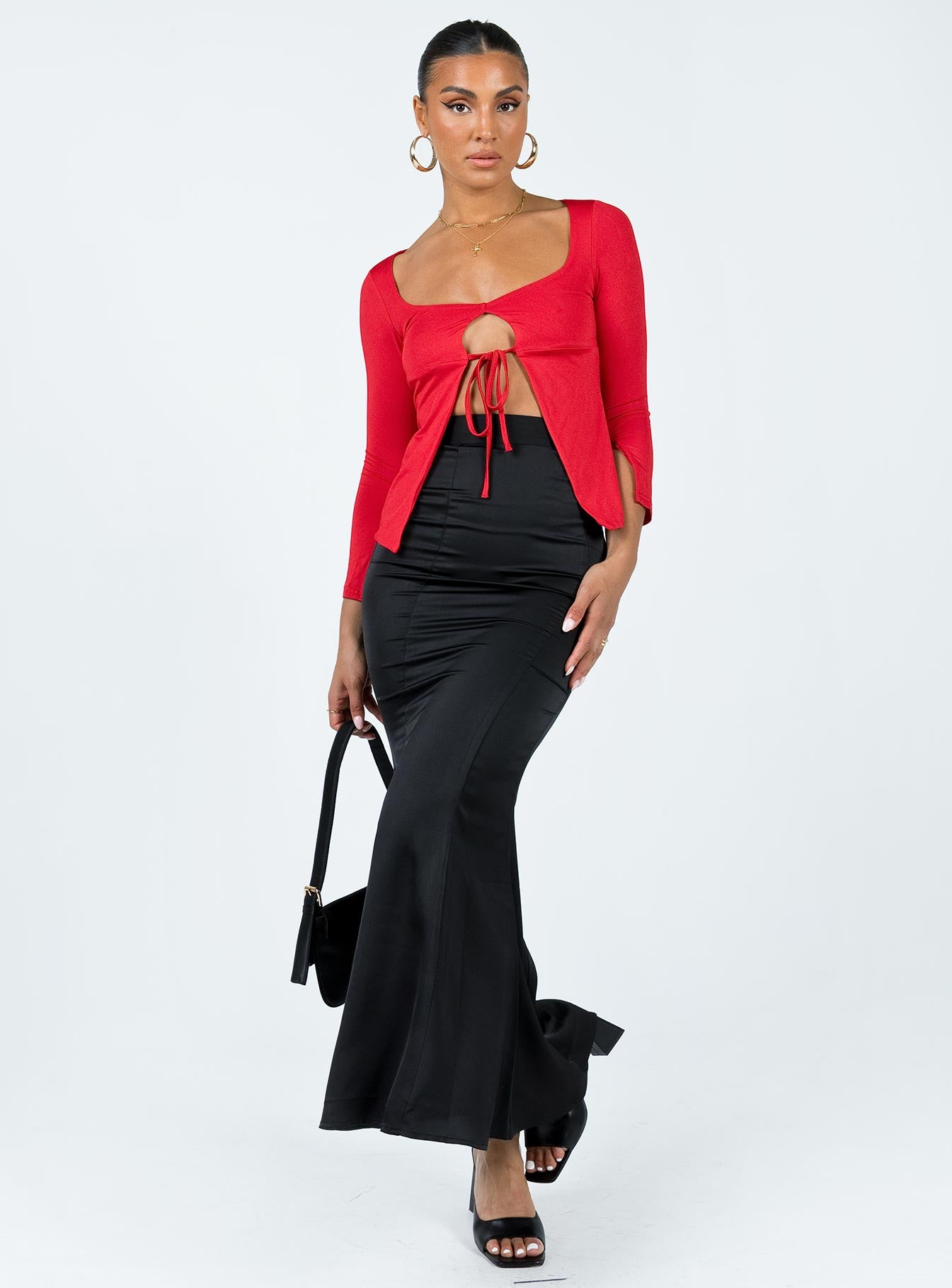 Front view of model wearing  front Princess Polly Three Fourth Sleeves Crew Neck  Corabelle Tie Up Top Red