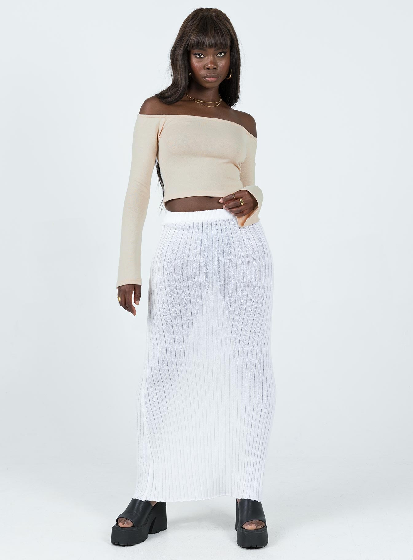 Front view of model wearing  front Princess Polly Sleeveless High Neck  Florette Off Shoulder Top Cream