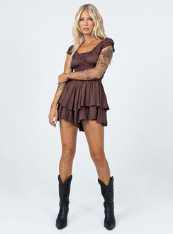 Romper Soft textured material Shirred waistband Ruffle detailing Elasticated neck and sleeves Can be worn on or off shoulder Layered ruffle hem Fully lined