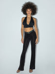 side view of model wearing Princess Polly Motel Tarava Trouser Crepe Hotfix Diamante Black 