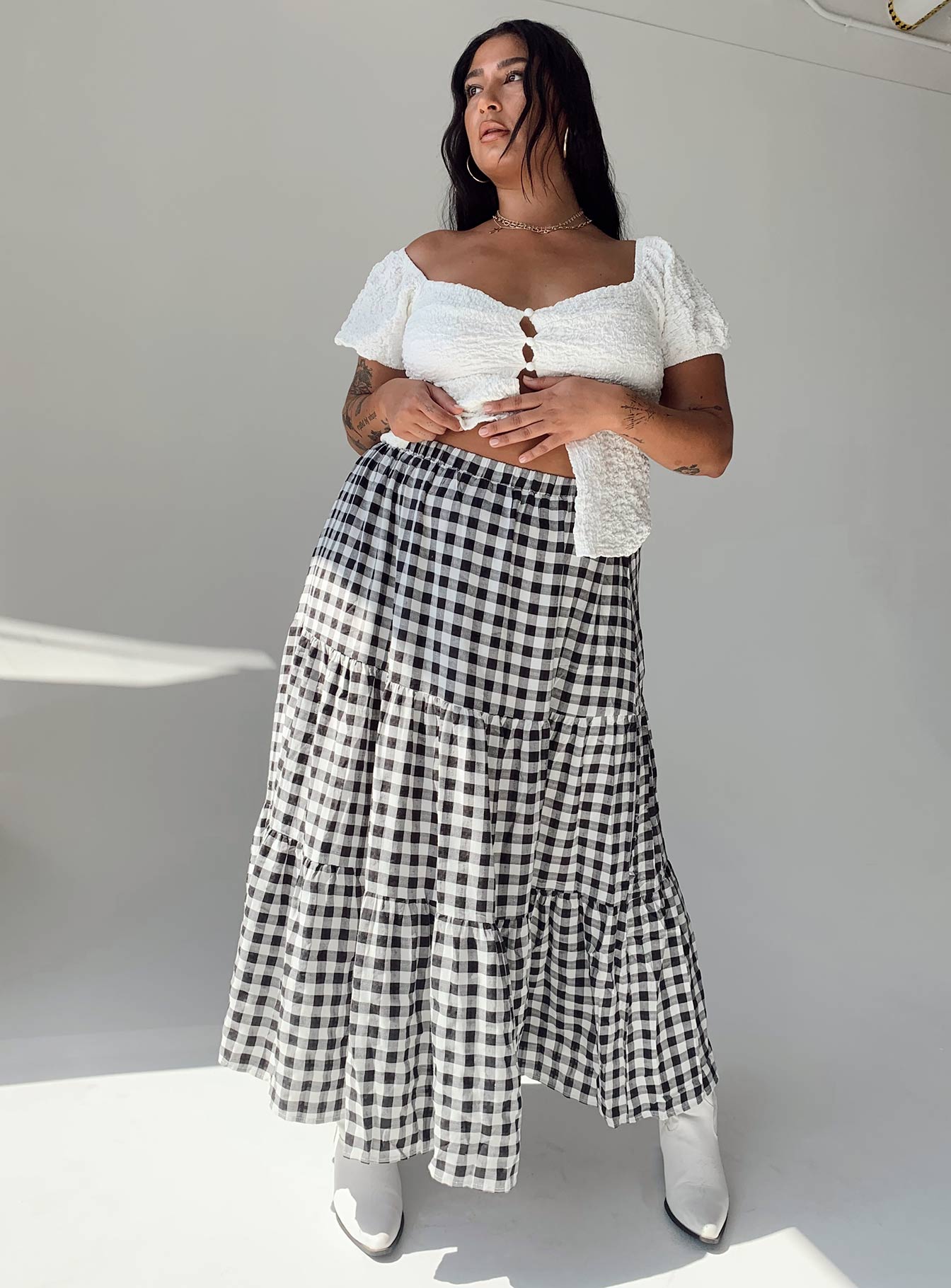 Front view of model wearing  front Hale Midi Skirt Black / White Curve Princess Polly  Maxi 