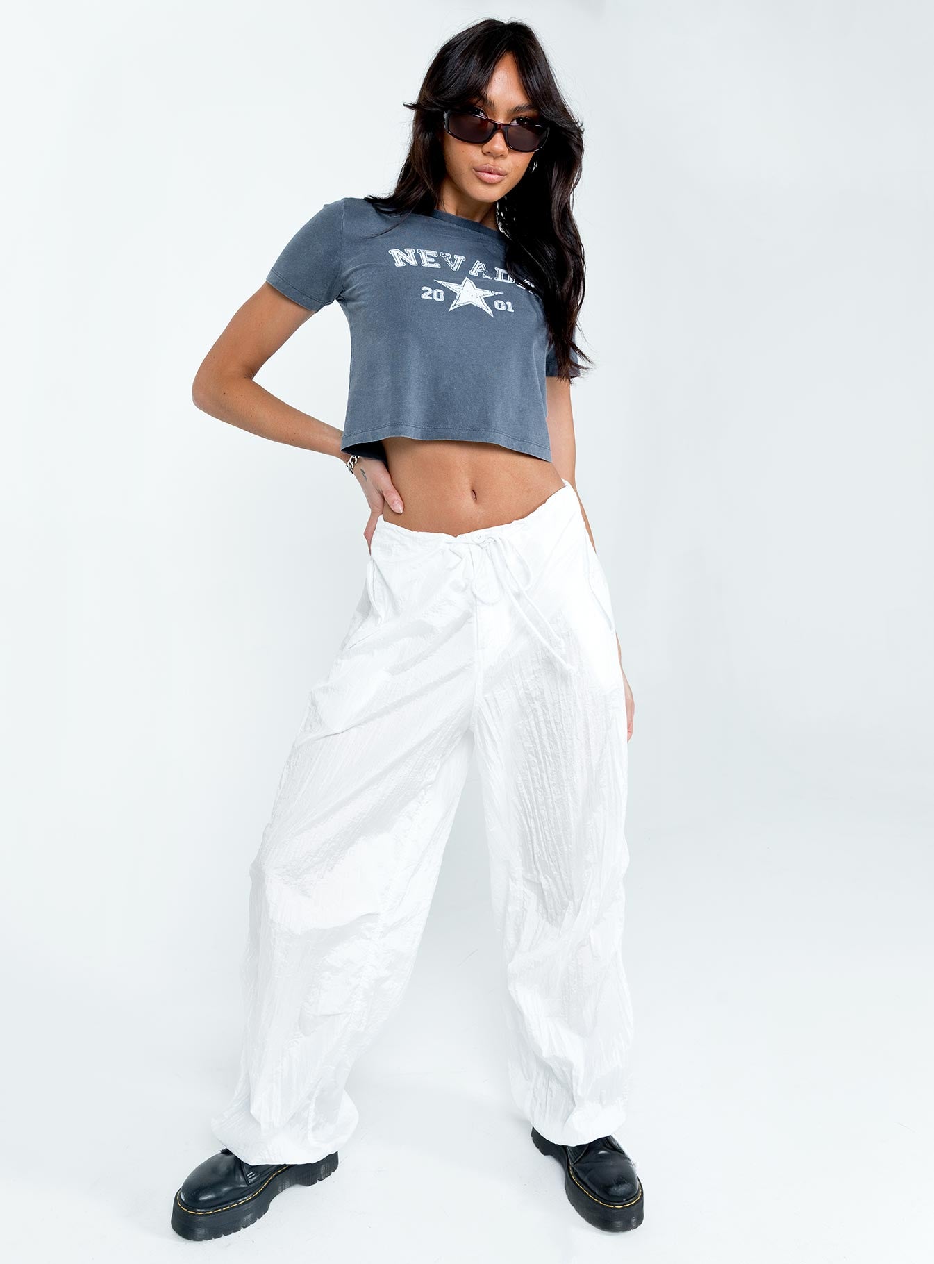 front view of model wearing Princess Polly Nevada Tee Navy Short Sleeves Crew Neck 