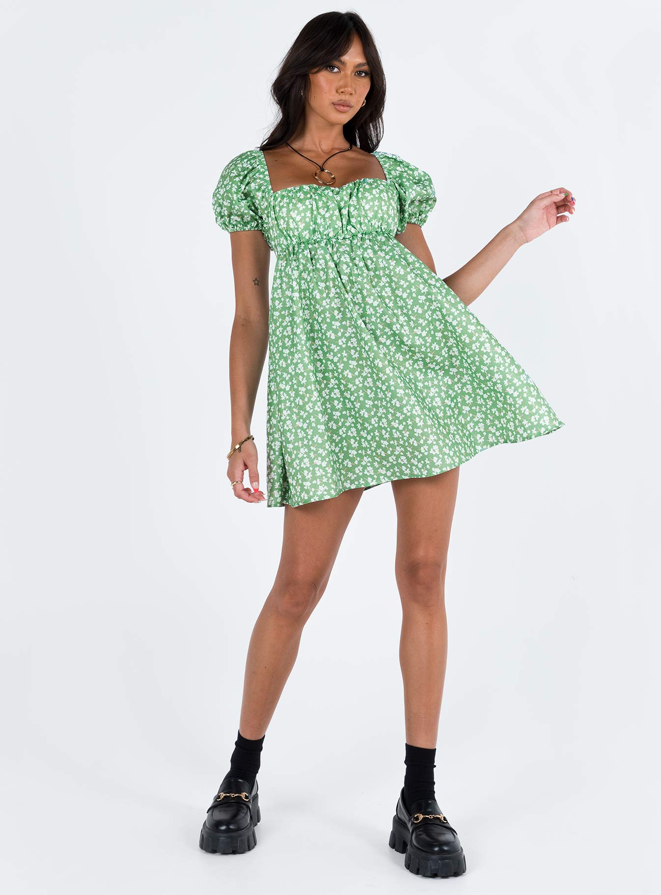 Front view of model wearing  front Princess Polly Crew Neck  Let's Dance Mini Dress Green Floral