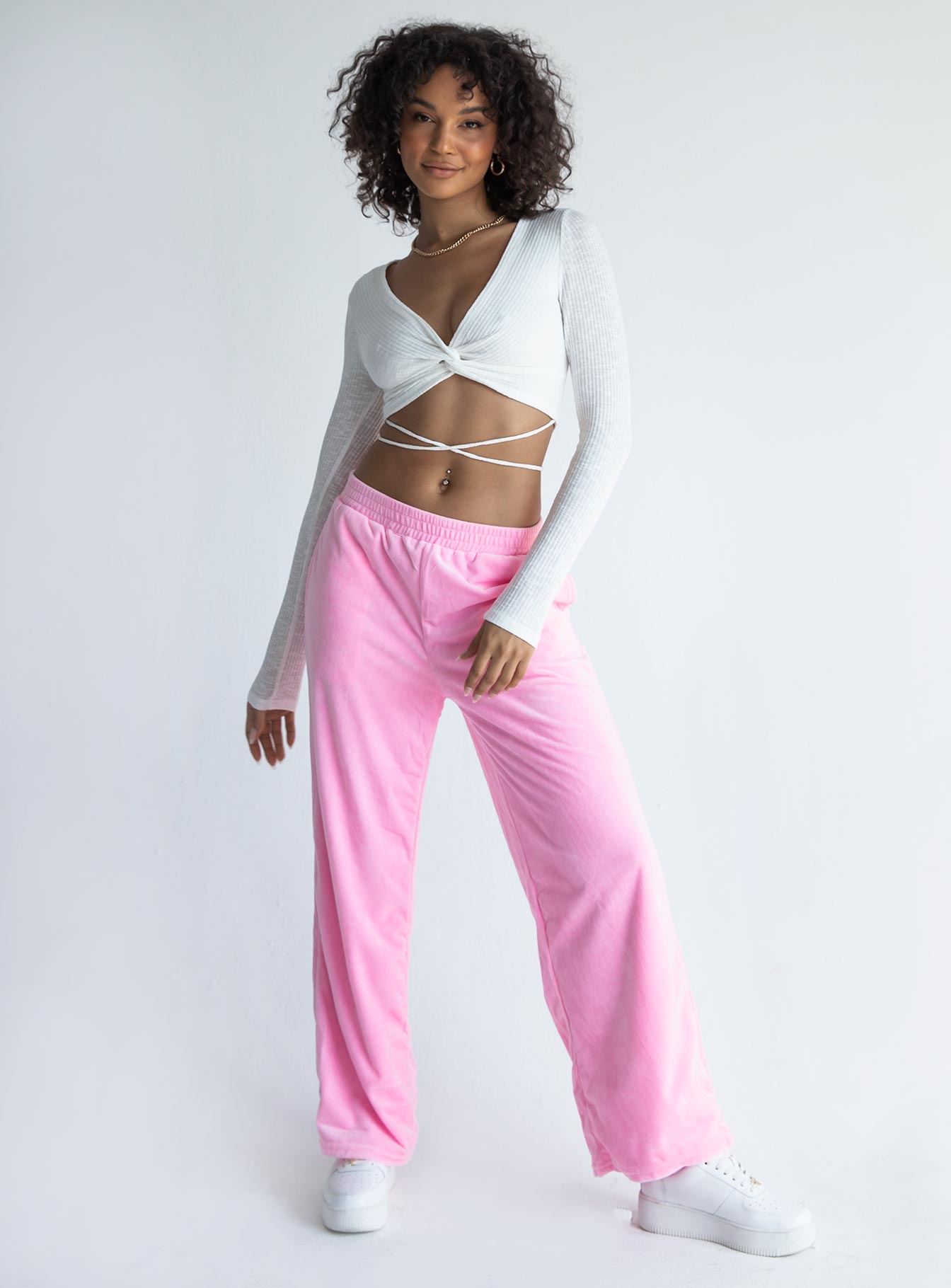 side view of model wearing Princess Polly Despina Long Sleeve Top White 