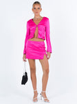 Pink matching set Silky material Long sleeve top V neckline Hook and eye fastening at bust Split hem Mini skirt Invisible zip fastening at back
