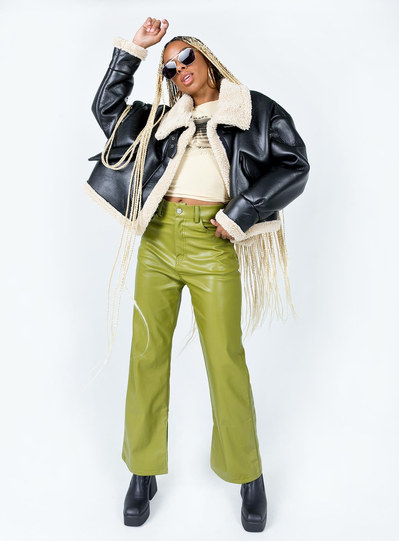 Oversized jacket Faux leather material Faux fur lining  Buckle fastening at neck  Press buttons Zip front  Fully lined 