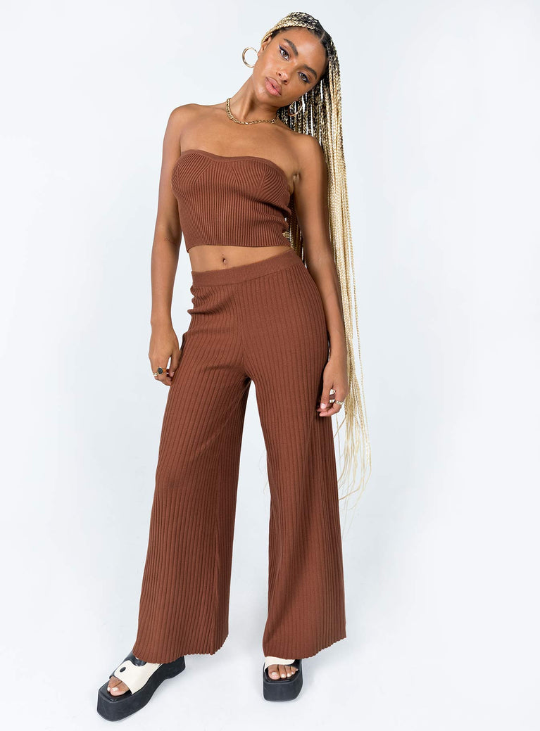 Matching set Ribbed knit material  Strapless top  High waisted pants  Elasticated waistband  Wide leg  Good stretch  Unlined 