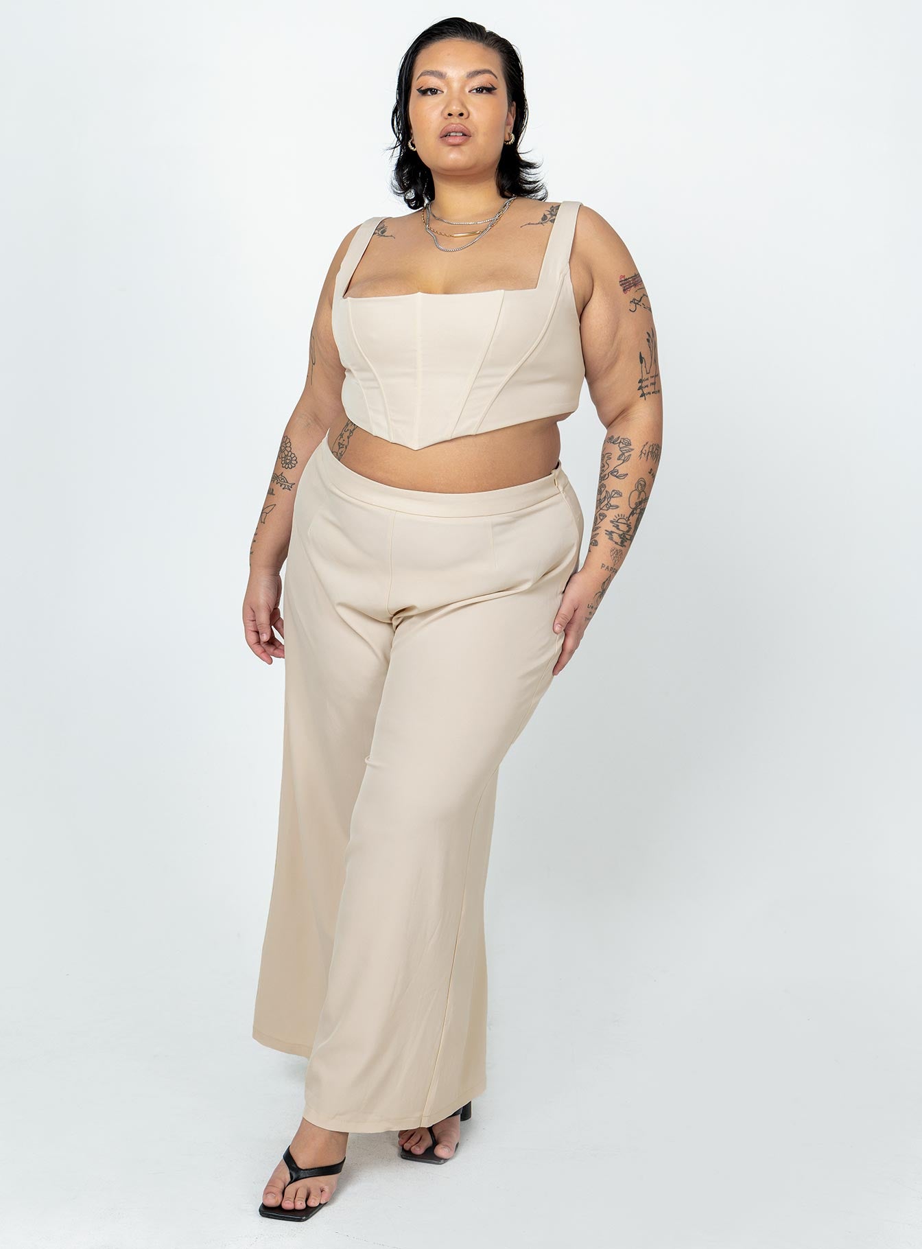 Matching set Corset top  Fixed straps Boning through front  Pointed hem Zip fastening at back  High waisted pants  Invisible zip fastening at side  Wide leg 