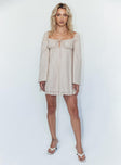 side view of model wearing Princess Polly Empress Of Love Long Sleeve Mini Dress Beige 