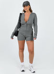 Long sleeve romper Ribbed material  V-neckline Button front fastening  Good stretch 