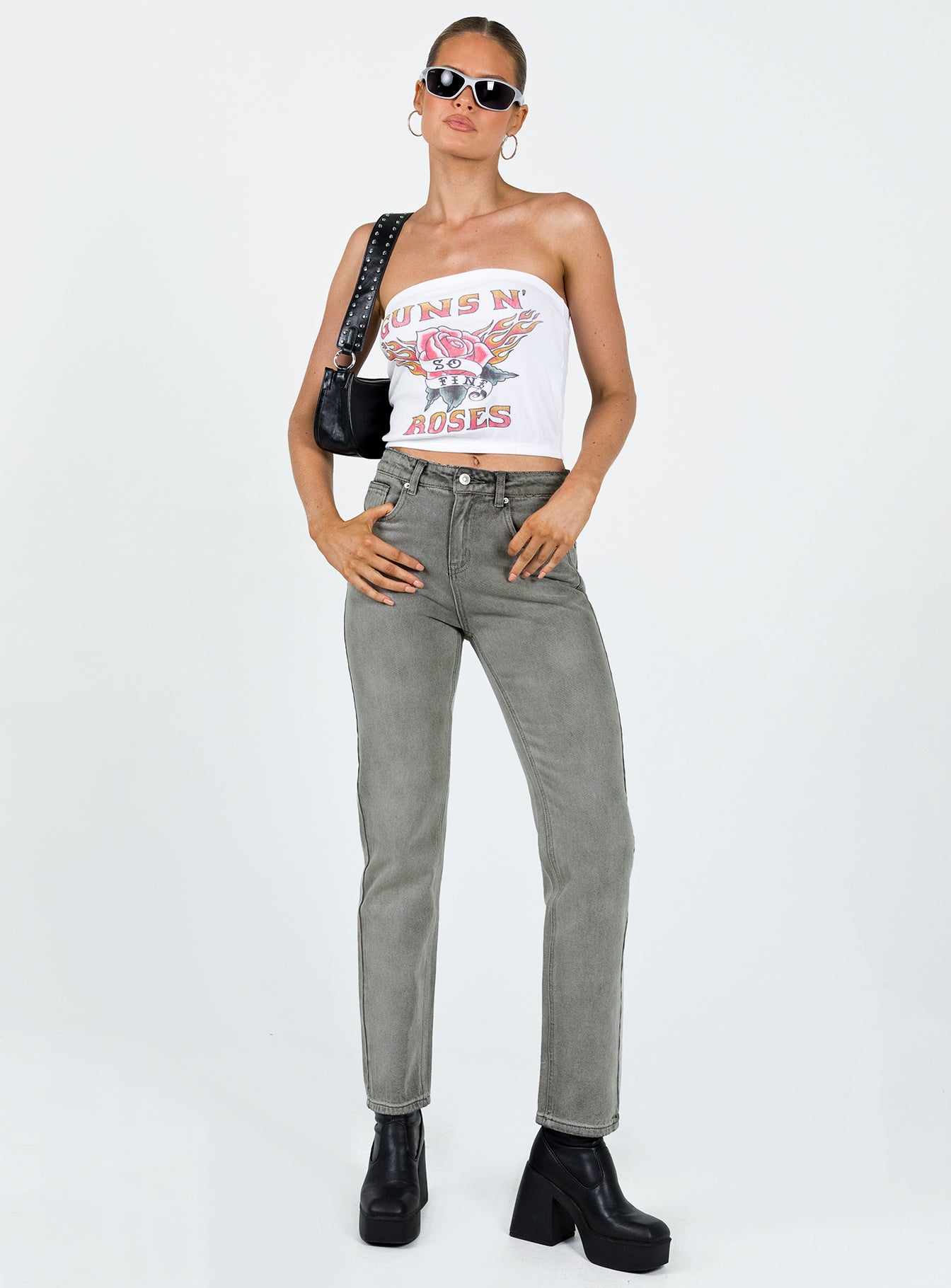 Front view of model wearing  front Princess Polly Mid Rise  Tangmere Mid Rise Slim Jeans Grey
