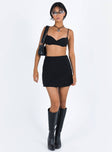 Black matching set Bralette style top Adjustable shoulder straps Wired cups Padded cups Elasticated band  Mini skirt Invisible zip fastening at side