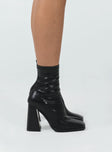 Boots Faux leather material  Fitted at ankle  Zip fastening at side  Square toe  Block heel 