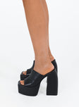 Platform heels Faux leather material Single thick upper Platform base Block heel Square toe