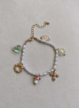 Bracelet Gold-toned Pearl detail Drop charms Lobster clasp fastening
