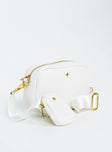Bag Gold-toned hardware  Zip fastening  Removable crossbody strap  Removable coin purse on strap  Flat base 