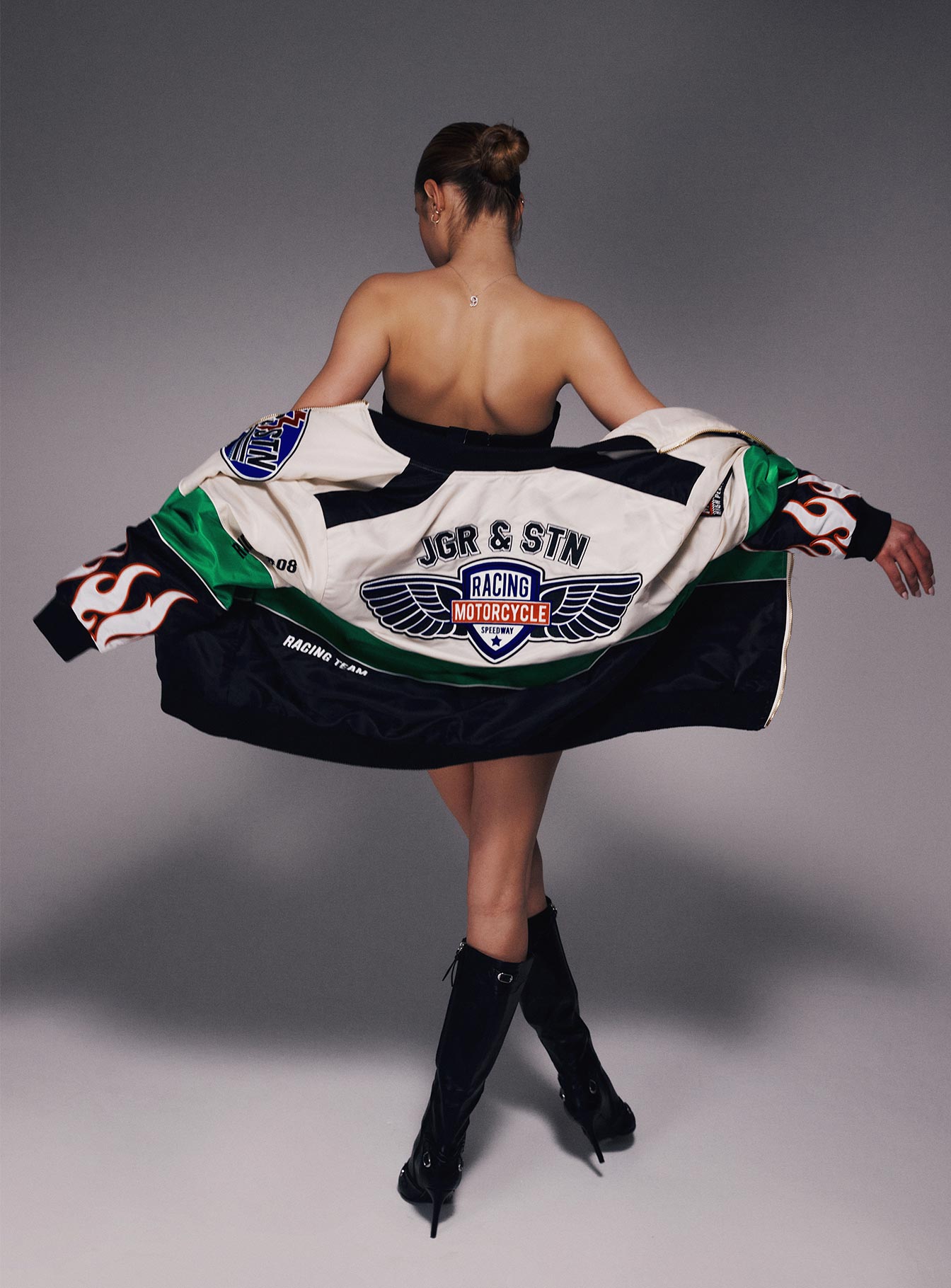 Moto jacket Graphic print Elasticated collar and cuffs Zip fastening at front Twin hip pockets