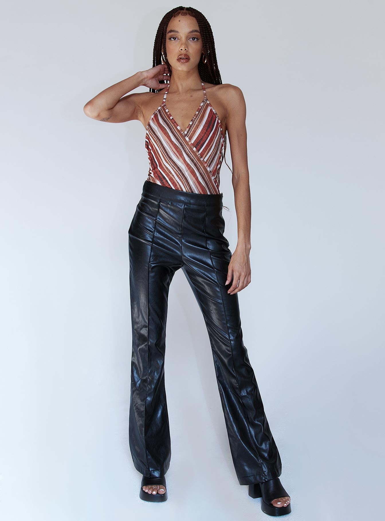 front view of model wearing Princess Polly Quinn Bodysuit Orange Multi Sleeveless V-Neck 