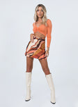 front view of model wearing Princess Polly Lucille Long Sleeve Top Orange 