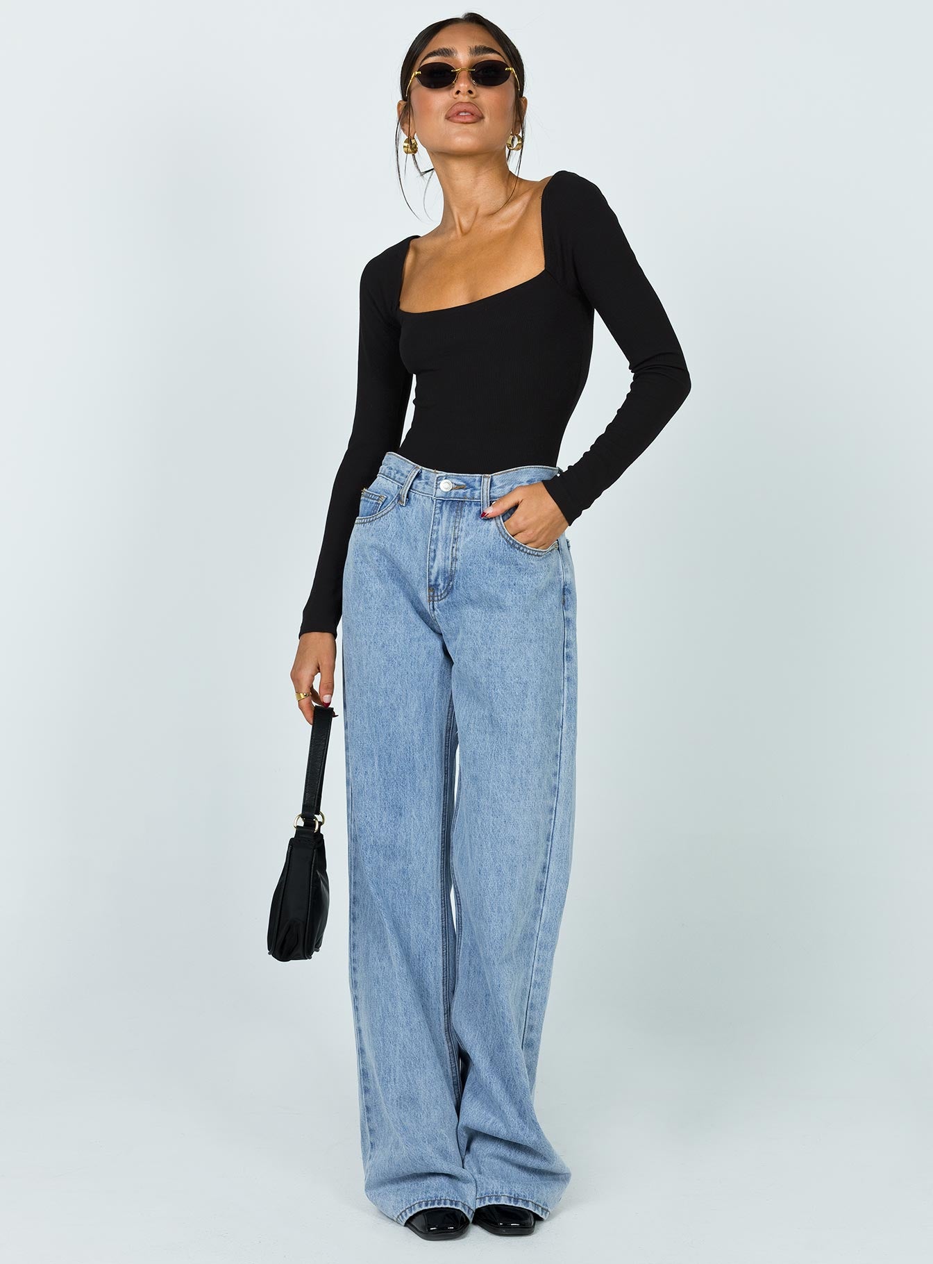 side view of model wearing Princess Polly Charlotte Bodysuit Black Tall Full Sleeves Square Neck 