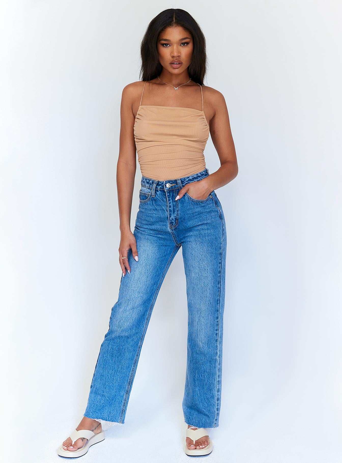 front view of model wearing Princess Polly Maverick Ruched Bodysuit Beige Sleeveless Square Neck 