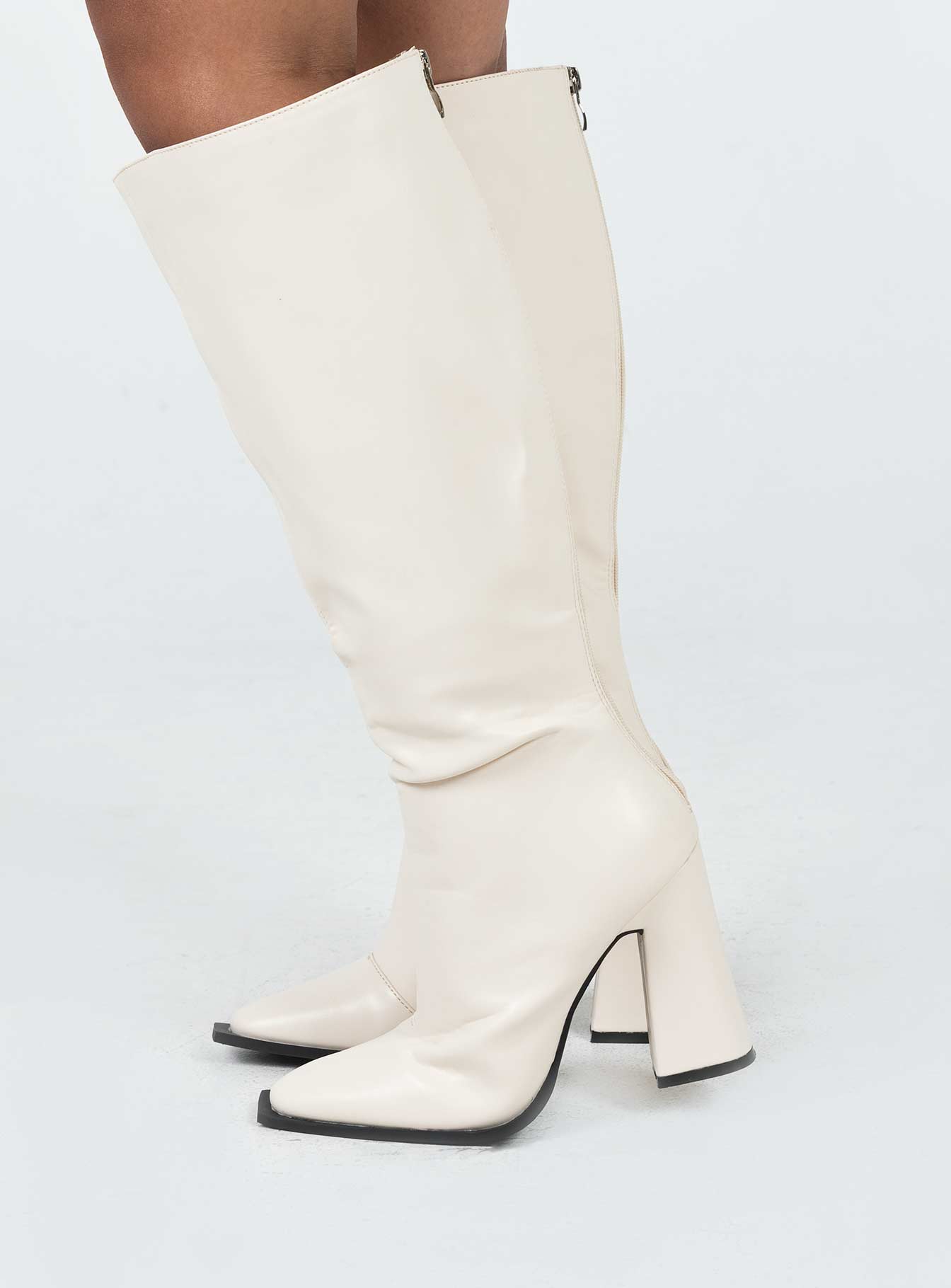 Boots Faux matte leather  Block heel  Square toe  Zip fastening at back 