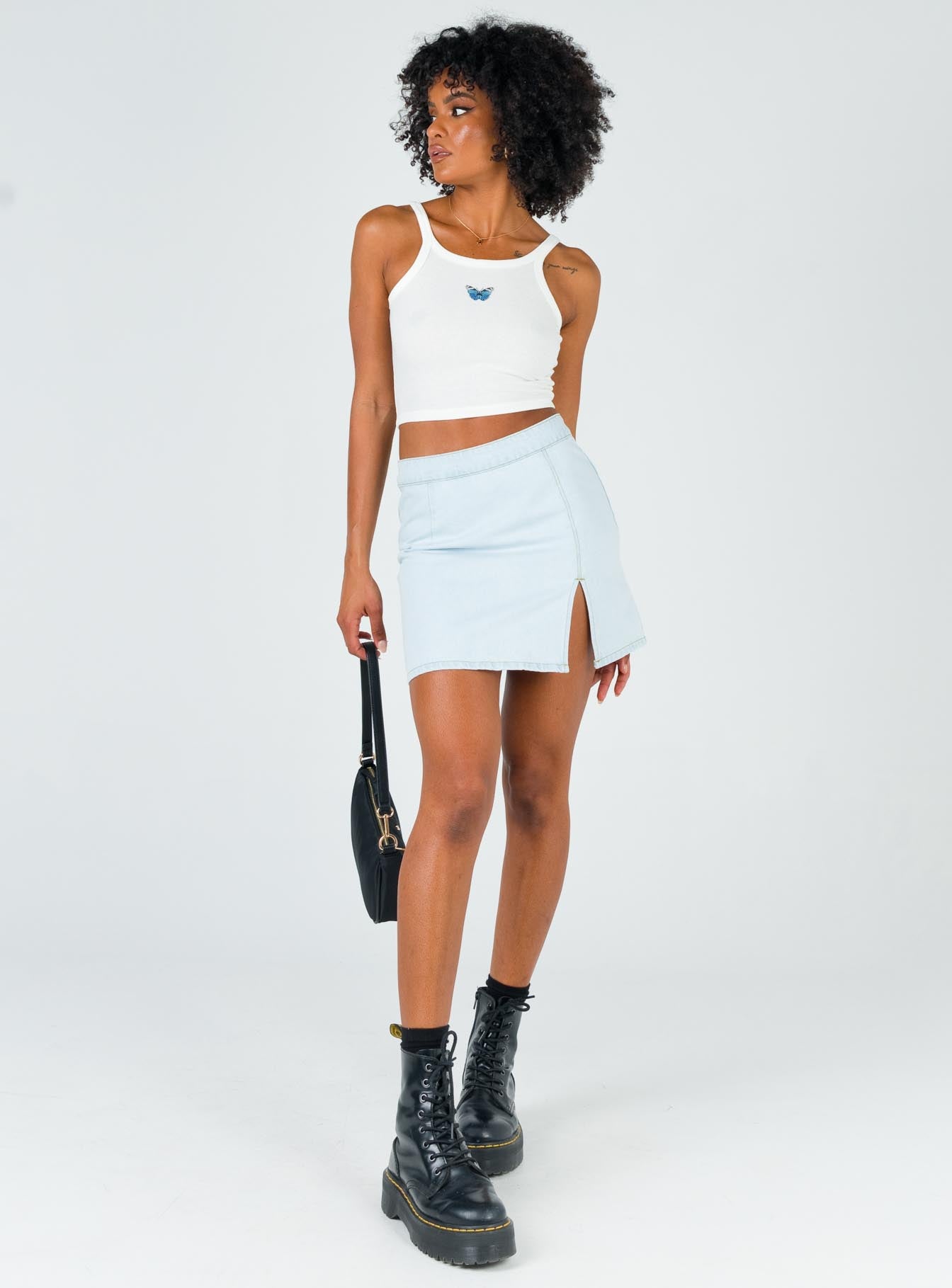   front view of model wearing Princess Polly The Lola Mini Skirt Light Wash Denim Skirts 