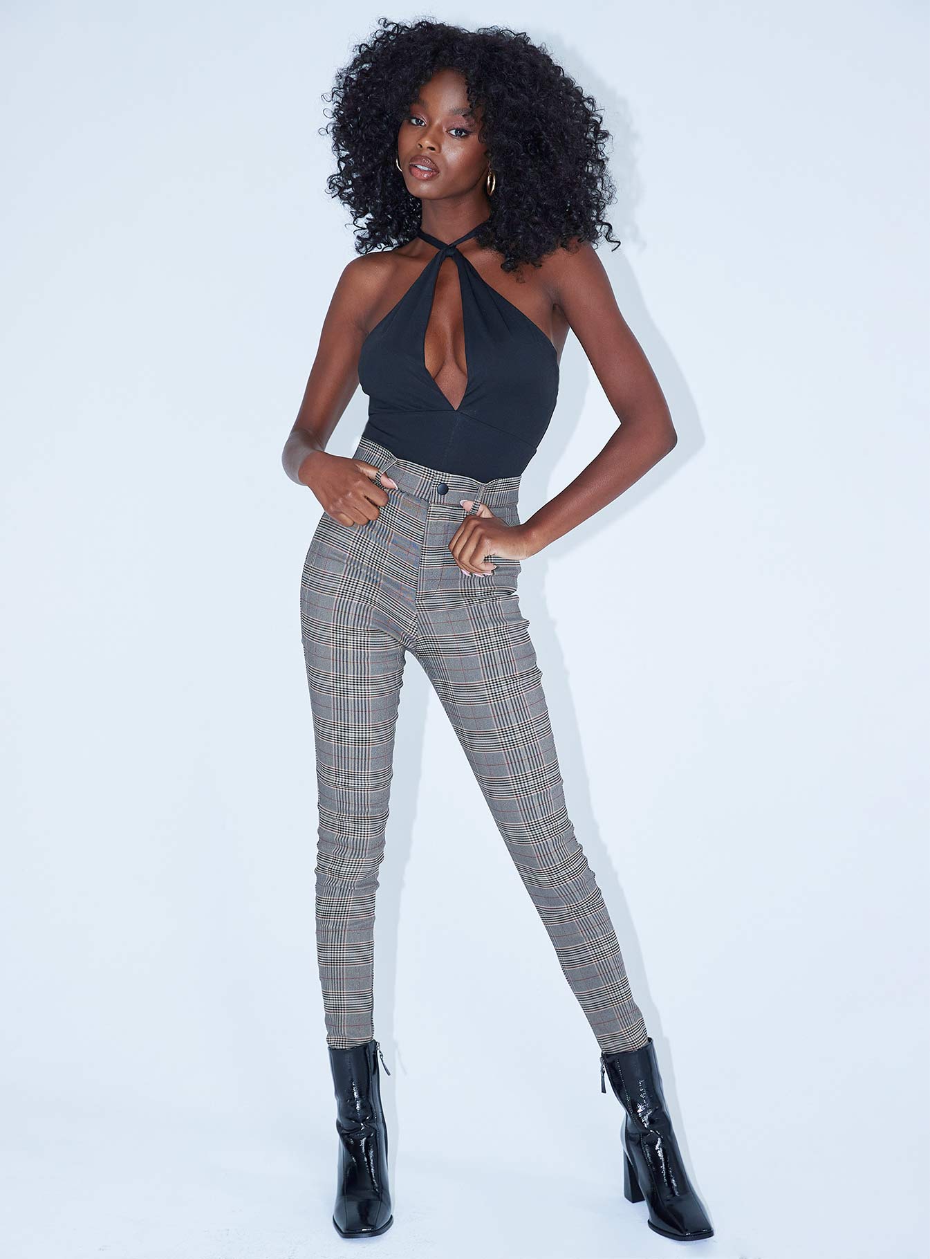 Front view of model wearing  front Princess Polly High Waisted Pants  Tikka Pants