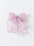 Hair bow  95% polyester 5% iron Sheer sparkly material  Silver-toned hardware  Snap clip fastening 