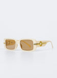 Sunglasses UV 400 Oversized style Rectangle frame Gold-toned detail on arms Moulded nose bridge Beige tinted lenses Lightweight