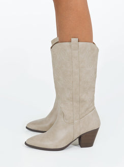 Cowgirl boots Faux leather material  Detail stitching  Mid calf length  Pull tabs  Pointed toe Block heel 