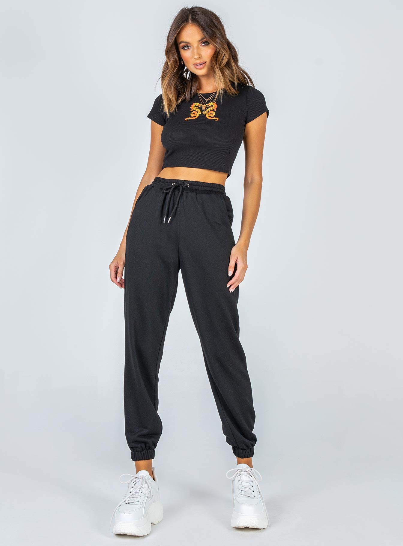 front view of model wearing Princess Polly Nero Sweat Pants Black 