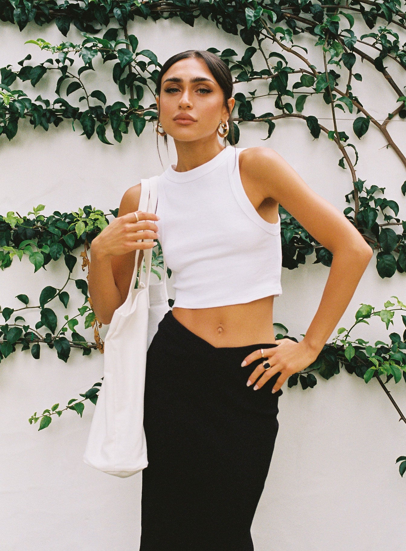 side view of model wearing Princess Polly Classic Tank Top White 