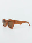 Brown sunglasses Oversized frame  Brown tinted lenses Moulded nose bridge  