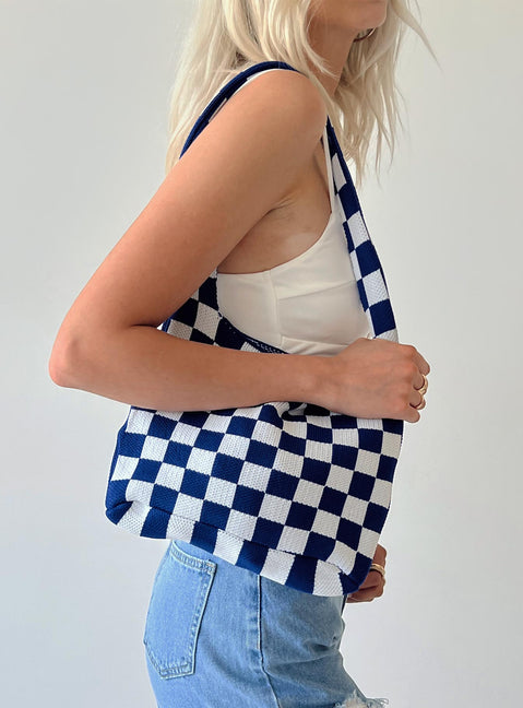 Bag 100% polyester Knit material  Checkerboard print  Single strap  One main compartment  Flat base 