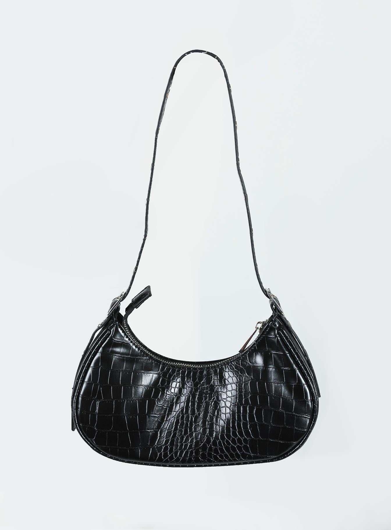 Shoulder bag Faux croc leather material  Zip fastening  Adjustable shoulder strap  Single external pocket with zip fastening Two inner pockets Silver-toned hardware Flat base 