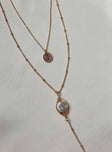 Necklace Pearl detail Drop down charms Lobster clasp fastening Gold-toned