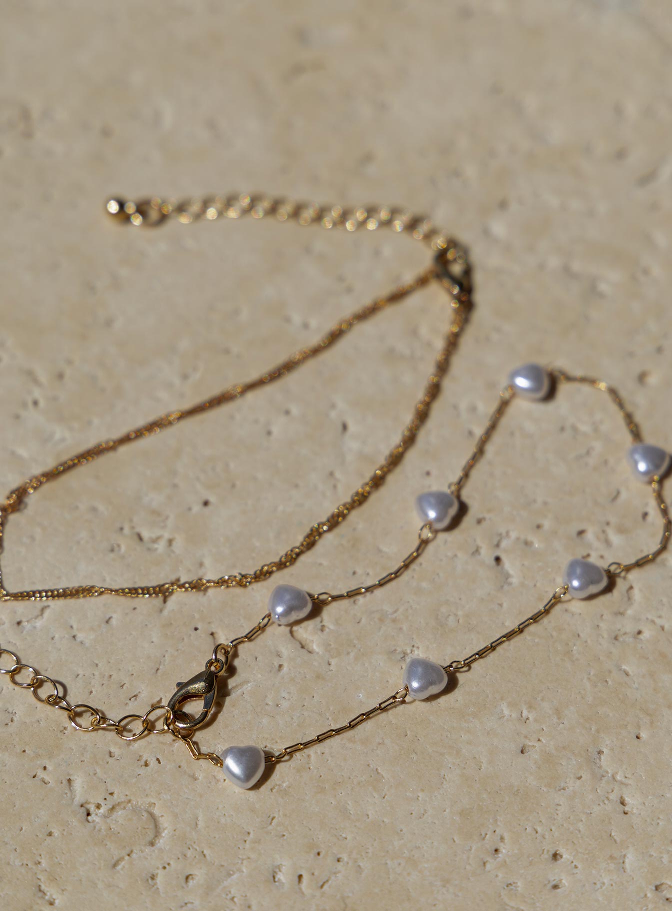 Anklet pack 70% brass, 30% plastic Pack of two Gold-toned Lobster clasp fastening Pearl detailing
