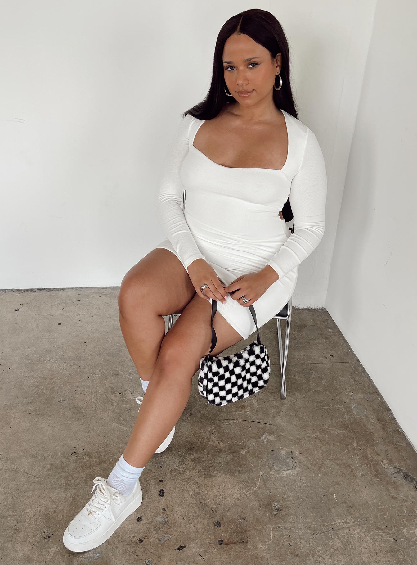 side view of model wearing Princess Polly Nolan Mini Dress White Curve 