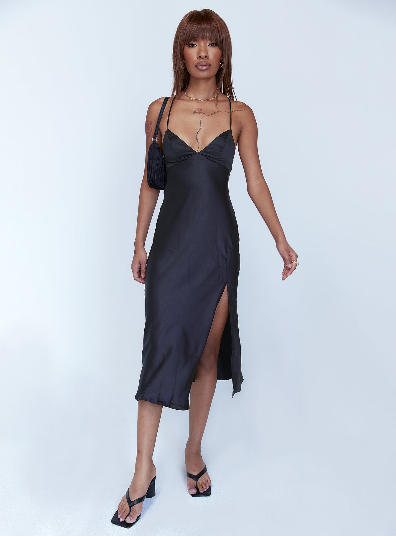 side view of model wearing Princess Polly Gigi Midi Dress Black 